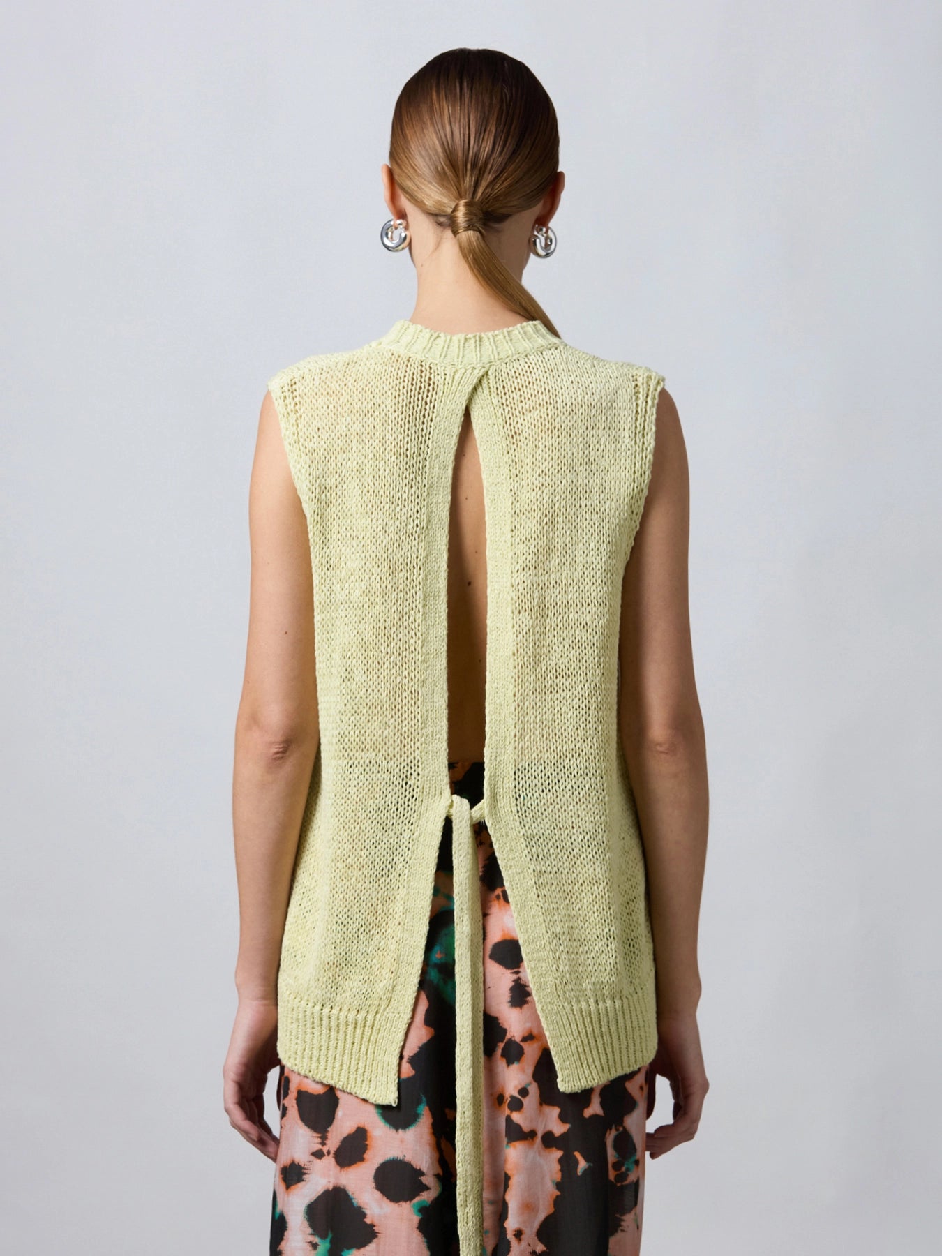 TOP CON SPACCO POSTERIORE